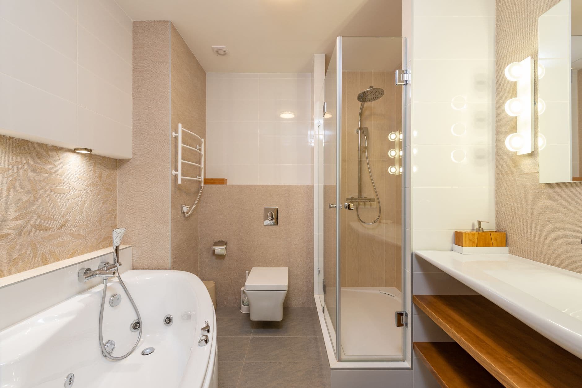 Contemporary bathroom featuring bathtub, shower, and elegant interior design elements.